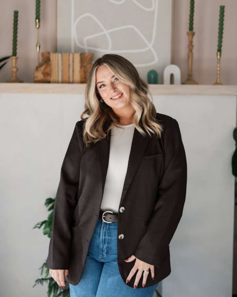 Jessica Chaote, K-Tip hair extension specialist in DFW, Texas, wearing a black blazer.